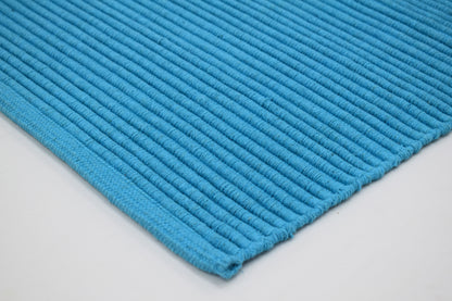 Tapete de playa tejido a mano Ocean Flame en Turquesa