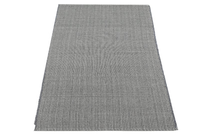 Tapete de playa tejido a mano en gris madera flotante