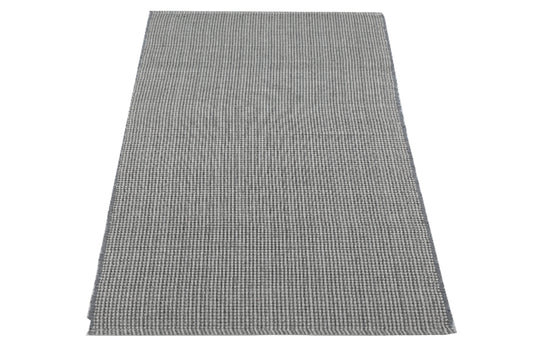 Tapete de playa tejido a mano en gris madera flotante