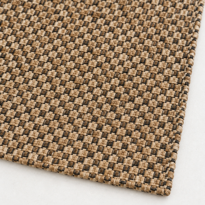 Detalle del tejido a mano de yute y algodón y borde acabado de la alfombra IC17720